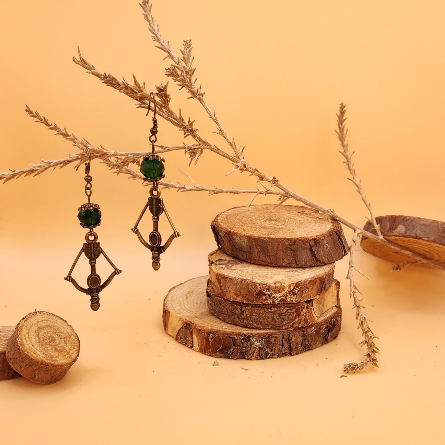 ArcherLass2 Bronze Colored & Emerald Faceted Glass 2.5" x 1" Bow & Arrow Drop Earring